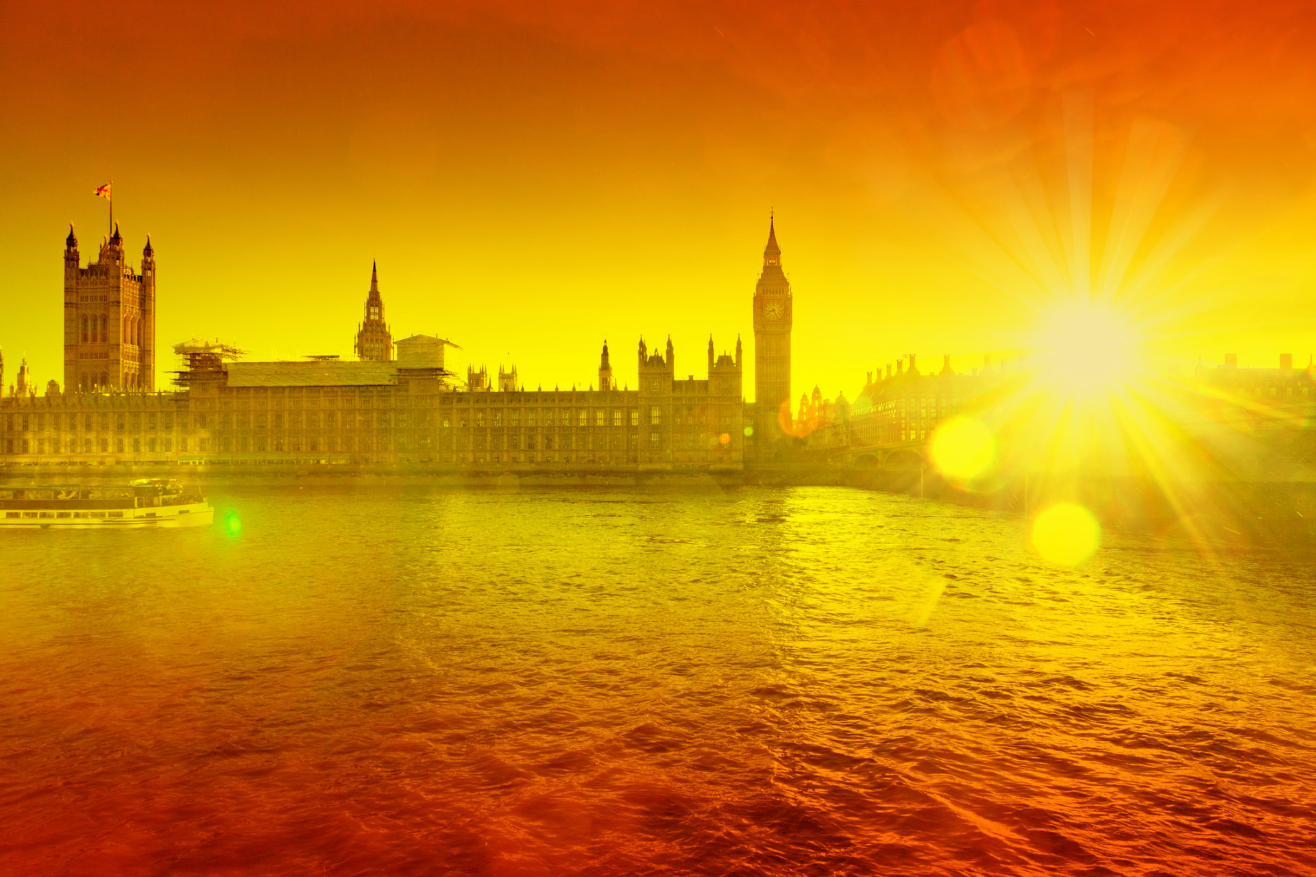 The river Thames with the houses of Parliament in silhouette in the background at sunset on a hot day (Image: Dreamstime)