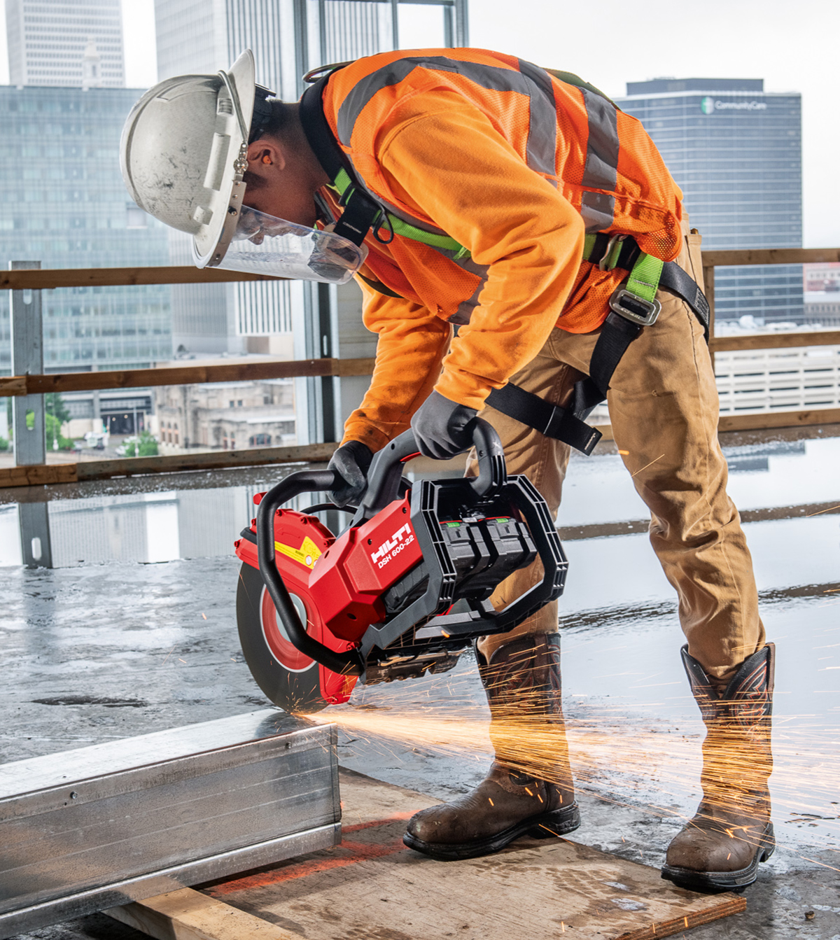 Worker with a Hilti angle grinder