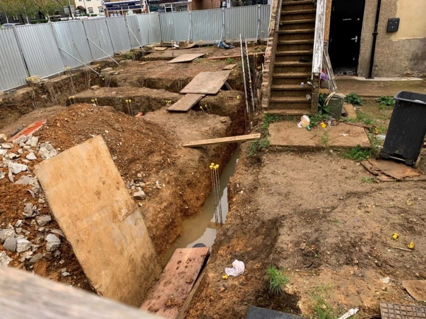construction worker drowns - A construction company has been fined after a man drowned when he fell into an exposed excavation at night